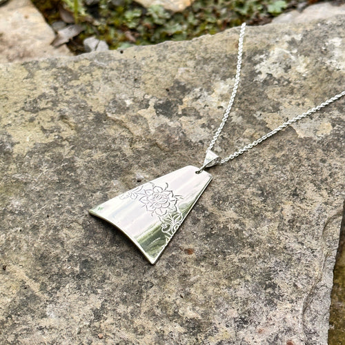 Floral centre print pendant sterling silver chain vintage trivet recycled restyled sustainable wearable artful jewellery