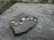 Load image into Gallery viewer, Mixed circle sun bracelet copper and silver, solid and open circles recycled hydro wire restyled vintage new wearable art Canadian artisan handmade jewellery