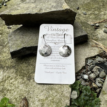 Load image into Gallery viewer, Circle earrings with small round cutout at top on short sterling silver fish hook wires vintage recycled bread plate restyled wearable art