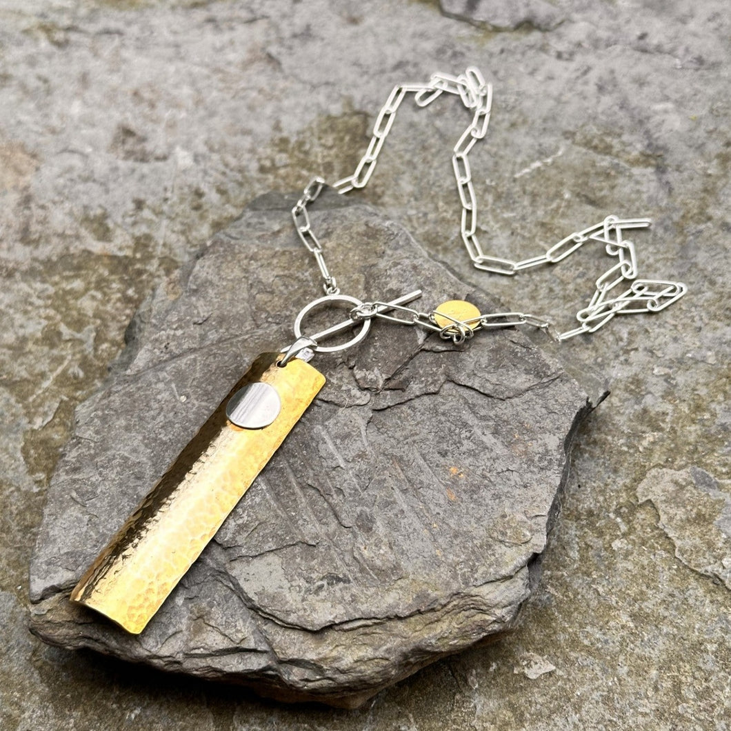 Layered rectangle pendant necklace textured brass bar with silver piece sterling silver paper clip chain recycled drum cymbals restyled wearable art