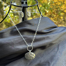 Load image into Gallery viewer, Shown on bodice. Oval necklace earring set muted floral bridal basket sterling silver chain  recycled restyled wearable Canadian art 
