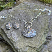 Load image into Gallery viewer, Oval necklace earring set muted floral bridal basket sterling silver chain  recycled restyled wearable Canadian art 
