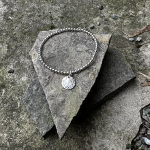 Load image into Gallery viewer, Sterling silver bead stretch bracelet with small circle charm bread plate recycled restyled one of a kind vintage jewellery 
