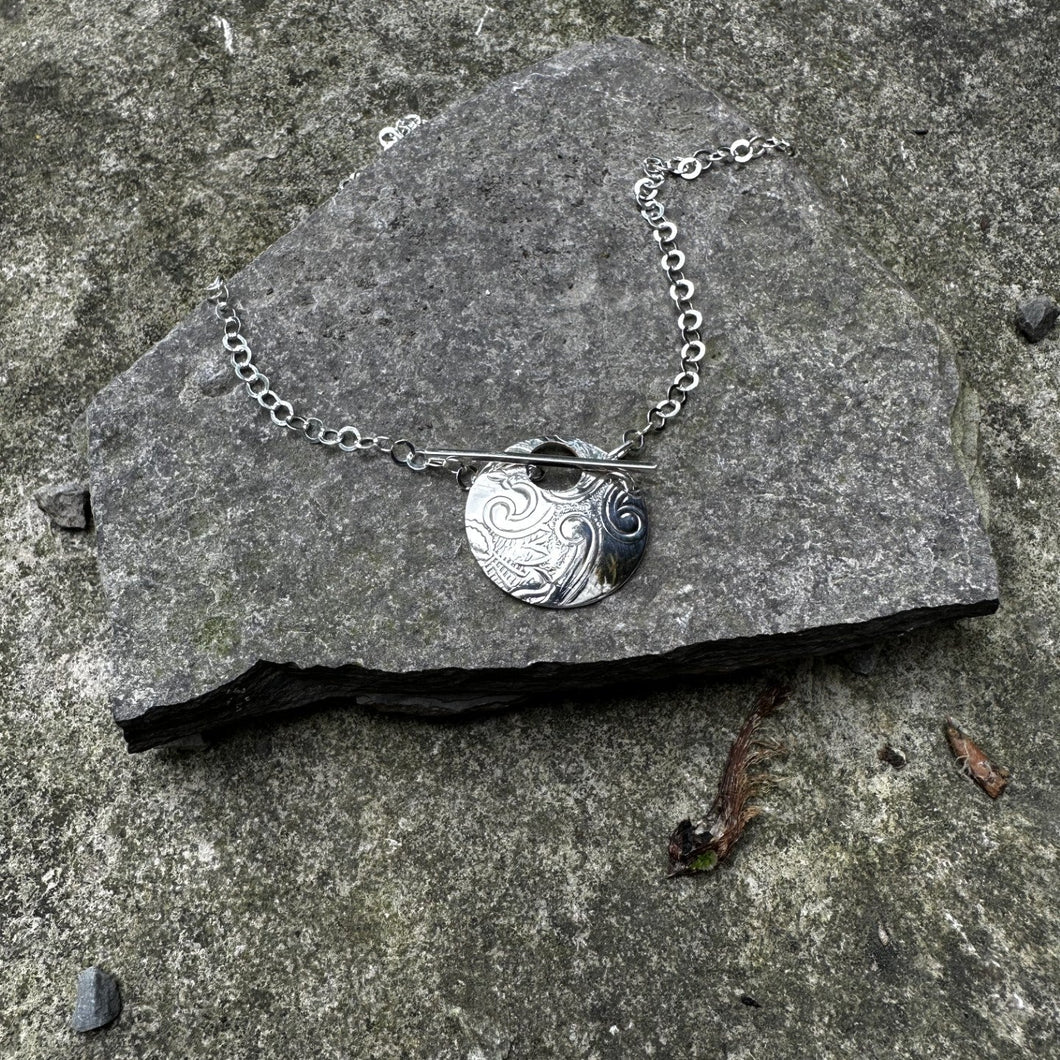 Circle pendant necklace toggle front sterling chain bread plate 
vintage antique recycled restyled Canadian handmade wearable art
