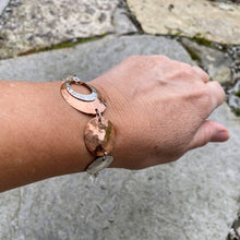 Load image into Gallery viewer, Circle sun wrap bracelet on wrist high shine copper antique recycled silver Canadian handmade
