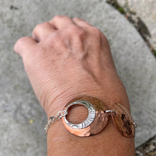 Load image into Gallery viewer, Circle sun wrap bracelet on wrist high shine copper antique recycled silver Canadian handmade
